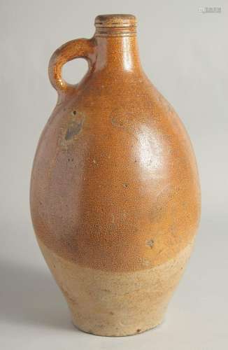 A LARGE EARLY STONEWARE FLAGON. 16ins high.