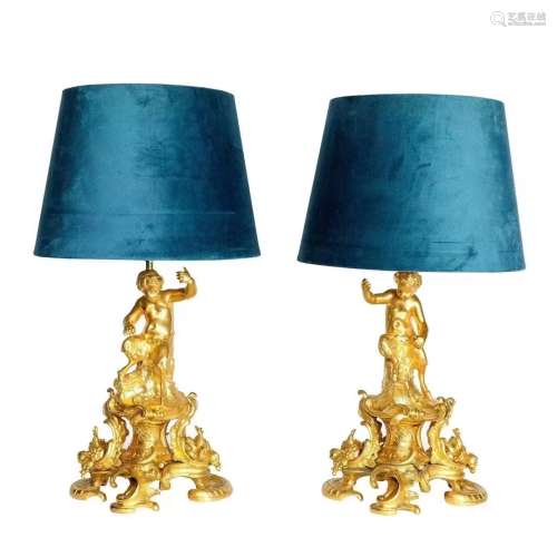 A pair of 19th century gilt bronze cherub table lamps