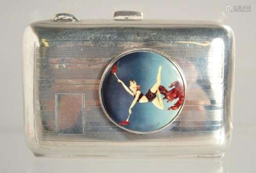 AN ENGRAVED TURNED CIGARETTE CASE. Birmingham, 1928 with ena...