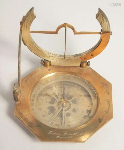 A GEORGIAN OCTAGONAL BRASS TRAVELLING COMPASS with silvered ...
