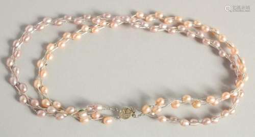 A SILVER AND PEARL DOUBLE ROW NECKLACE.