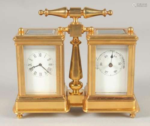 A GILT BRONZE DOUBLE CARRIAGE CLOCK. 4ins high with carrying...