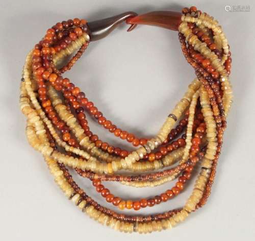 A TRIBAL HORN NECKLACE.