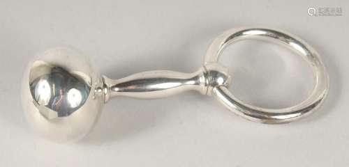 A BABY S SILVER RATTLE in a white box.