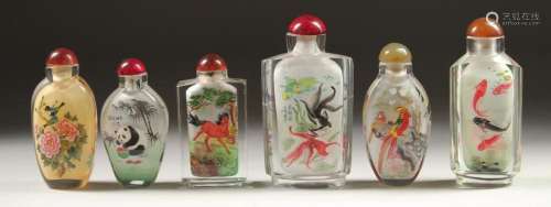 A COLLECTION OF SIX CHINESE SCENT BOTTLES AND STOPPERS paint...