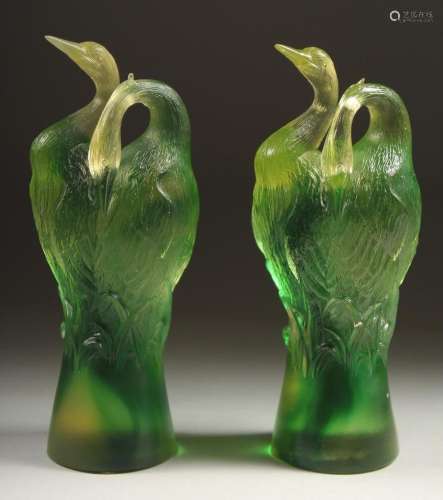A GOOD PAIR OF TITTOT GREEN GLASS ENTWINED BIRDS. Signed 6.5...