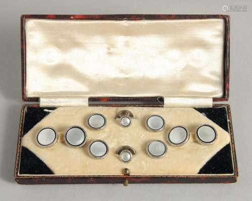 A MOTHER-OF-PEARL SET OF DRESS CUFFLINKS AND STUDS.