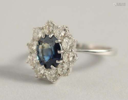 A SUPERB 18CT WHITE GOLD, SAPPHIRE AND DIAMOND CLUSTER RING....