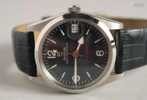 A GENTLEMAN S TUDOR OYSTER WRISTWATCH with leather strap.