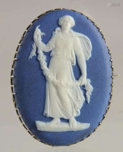 A WEDGWOOD BLUE JASPER AND SILVER BROOCH.