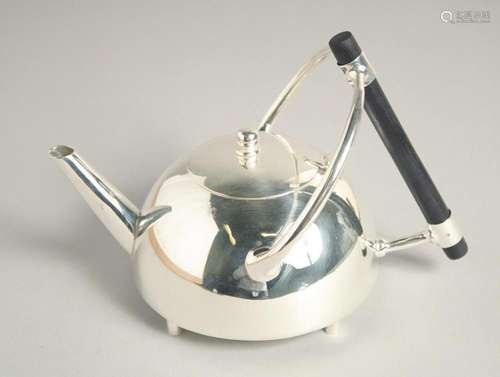 A CIRCULAR CHRISTOPHER DRESSER DESIGN SILVER PLATED TEA POT....