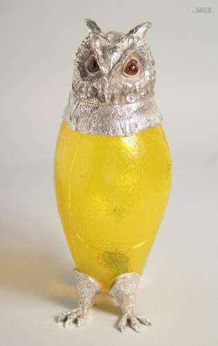 A GOOD LARGE YELLOW GLASS AND SILVER PLATED JUG. 11ins high.