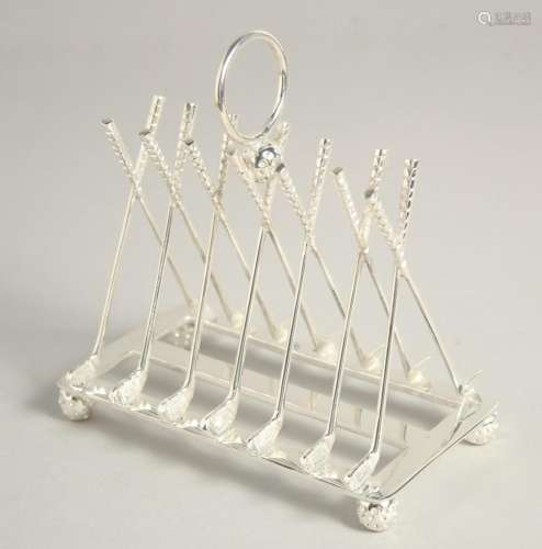 A SILVER PLATED SIX DIVISION TOAST RACK with cross golf club...