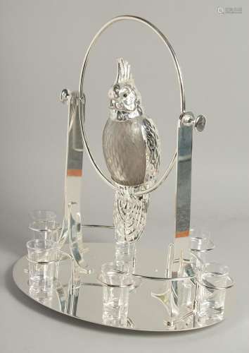A SILVER PLATED COCKTAIL SET as a parrot on a perch, six gla...