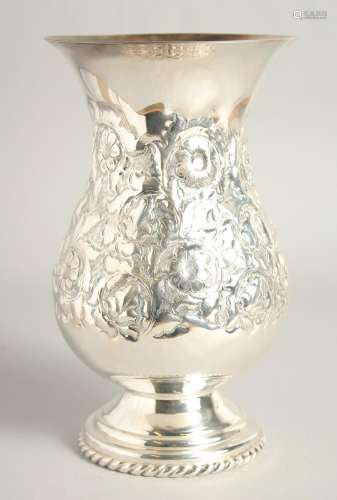 A MATCHING CONTINENTAL SILVER PLATED VASE. with floral repou...