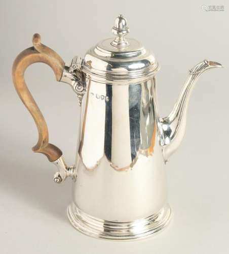 A GOOD VICTORIAN SILVER TAPERING COFFEE POT with wooden hand...