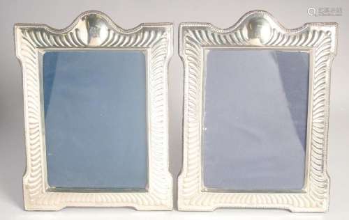 A LARGE PAIR OF SILVER PHOTOGRAPH FRAMES London 1992