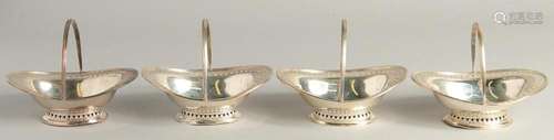 A SET OF FOUR SMALL SILVER OVAL PIERCED BASKETS with swing h...