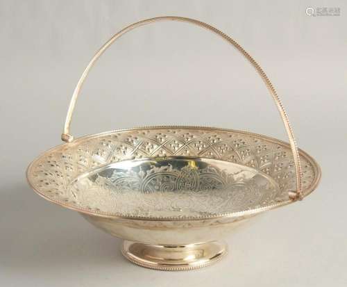 A VICTORIAN SILVER CIRCULAR BASKET with engraved and repouss...