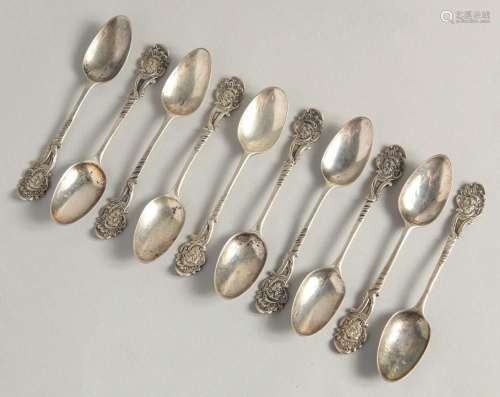 A SET OF TEN GEORGE II PICTURE BACK SILVER TEASPOONS with ca...