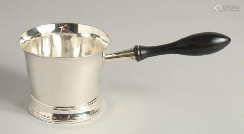 A GEORGE III SILVER BRANDY PAN with turned wood handle. 3.75...