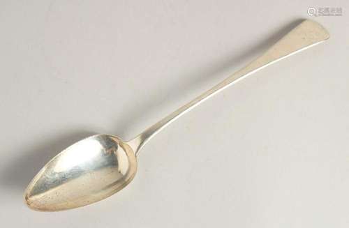 A GEORGE III SILVER LONG HANDLED GRAVY SPOON. 12ins long. Lo...