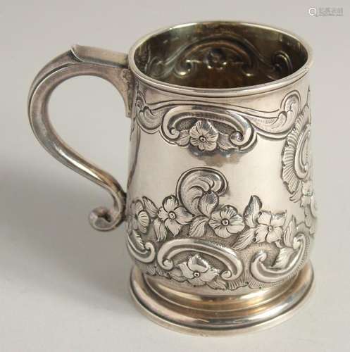 A GEORGE I SILVER CHASED HALF PINT TANKARD. London 1726. Mak...