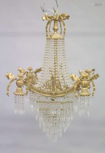 A GOOD GILT BRONZE AND CRYSTAL CHANDELIER with prism drops a...