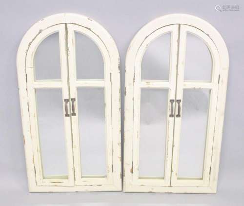 A PAIR OF WHITE ARCHED SHUTTER MIRRORS. 3ft 6ins x 1st 8ins.