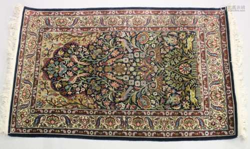 A GOOD SMALL PERSIAN RUG SHIRVAN OR ISFAHAN, dark blue groun...