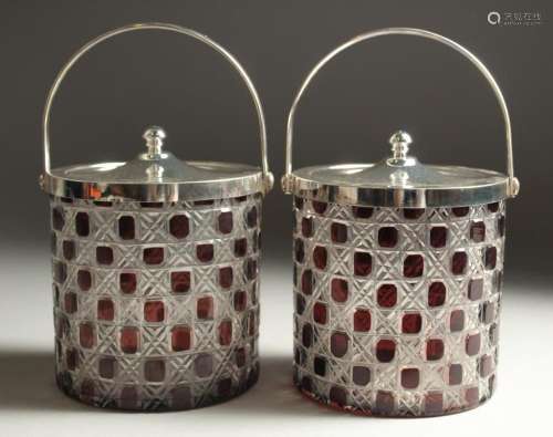A PAIR OF CUT GLASS, RUBY TINTED AND PLATE BISCUIT BARRELS.