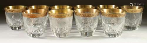 A GOOD SET OF TEN TUMBLERS with gilt rims.