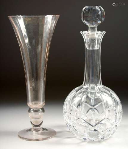 A CUT GLASS PORT DECANTER AND STOPPER and a TULIP GLASS VASE...