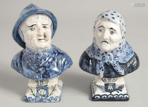 A SMALL PAIR OF DUTCH BLUE AND WHITE BUSTS OF A MAN AND WOMA...