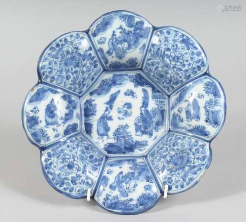 A 19TH CENTURY BLUE AND WHITE DEEP CHARGER with Chinese desi...