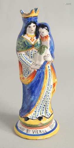 A MAJOLICA POTTERY FIGURE "Ste. VIERGE". 9.5ins hi...