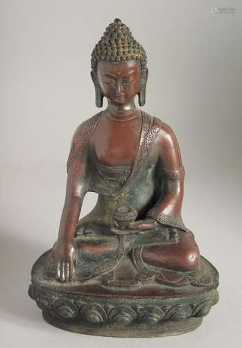 A BRONZE SEATED BUDDHA. 12ins high.