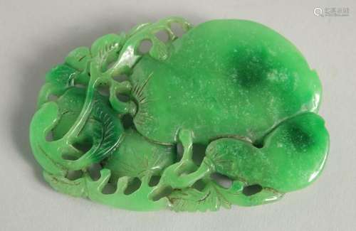 A CHINESE CARVED LARGE JADE PENDANT. 3ins.