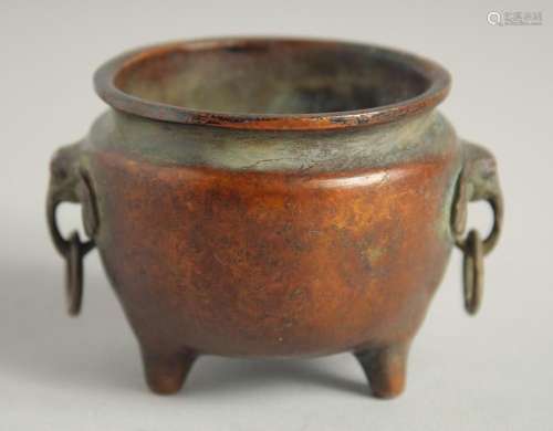 A SMALL CHINESE BRONZE CIRCULAR CENSER with elephant handles...