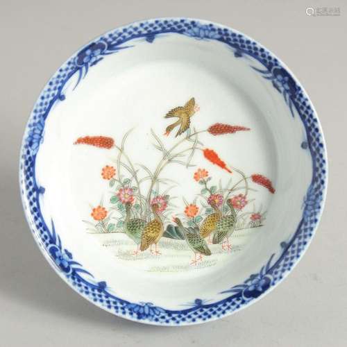 A SMALL BLUE GLAZE SHALLOW BOWL, the interior centre decorat...