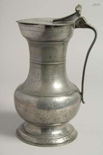 A GOOD 18TH CENTURY SWISS PEWTER FLAGON AND COVER. 10ins hig...