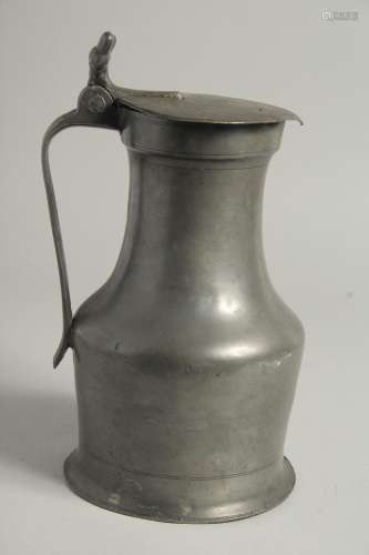 AN 18TH CENTURY FRENCH PEWTER JUG AND COVER. 10ins high.