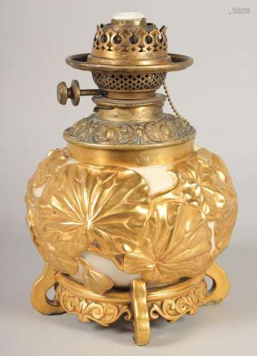 A ROYAL WORCESTER PORCELAIN BULBOUS OIL LAMP. 12ins