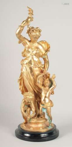 A GOOD GILT METAL GROUP OF A CLASSICAL YOUNG LADY and two cu...