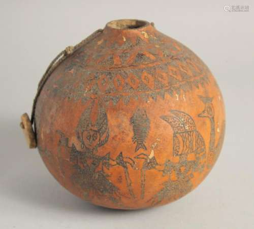 A GOOD TRIBAL DECORATED GOURD. 6ins.