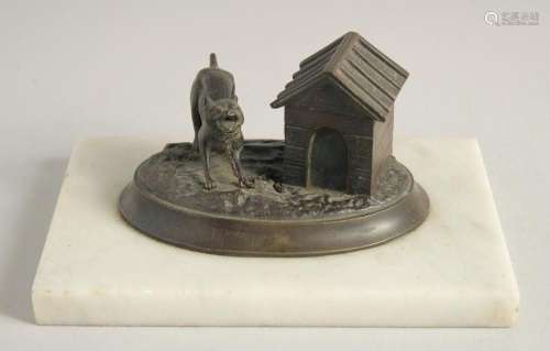 A BRONZED OVAL INKSTAND with a dog, on a marble base. 6.5ins