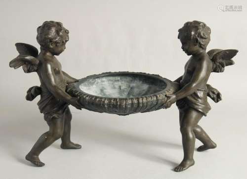 A GOOD 19TH CENTURY FRENCH BRONZE CUPID CENTREPIECE as a bow...