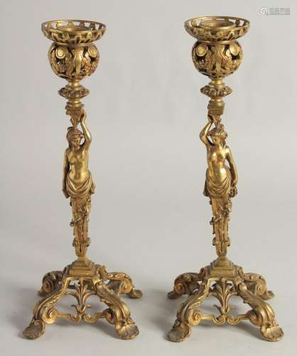 A GOOD PAIR OF ORMOLU CANDLESTICKS, ROCOCCO with classical f...