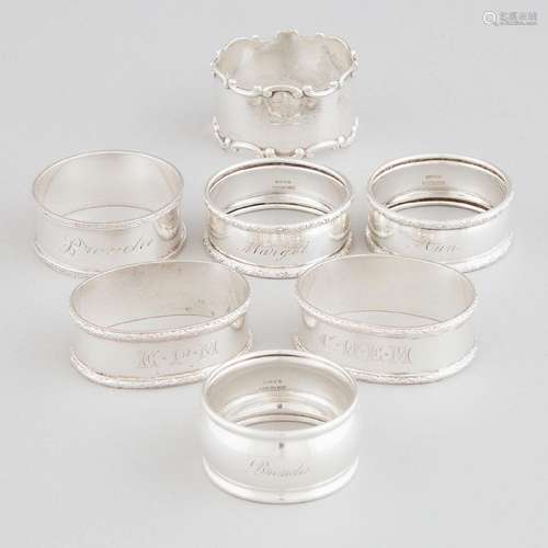 Seven Canadian and English Silver Napkin Rings, 20th centur