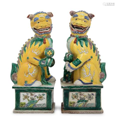 A Large Pair of Chinese Famille Jaune Porcelain Figures of F...